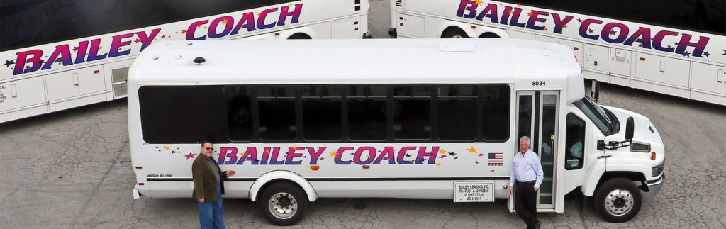 3 Bailey Coach Buses with Staff